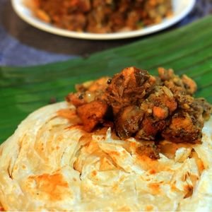 Butter Chicken Kizhi Porotta